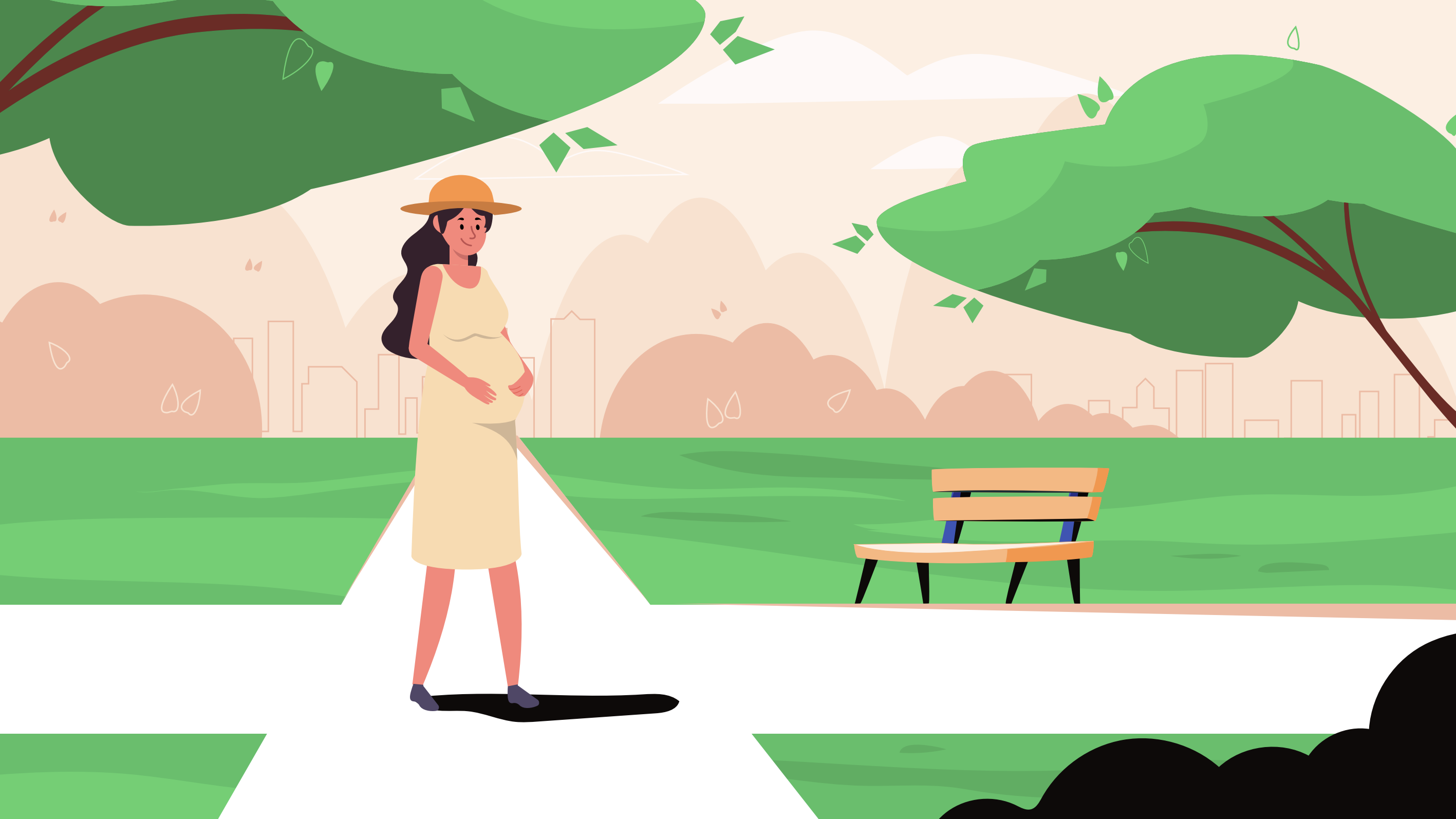 Pregnant woman walking through a green Mediterranean city park