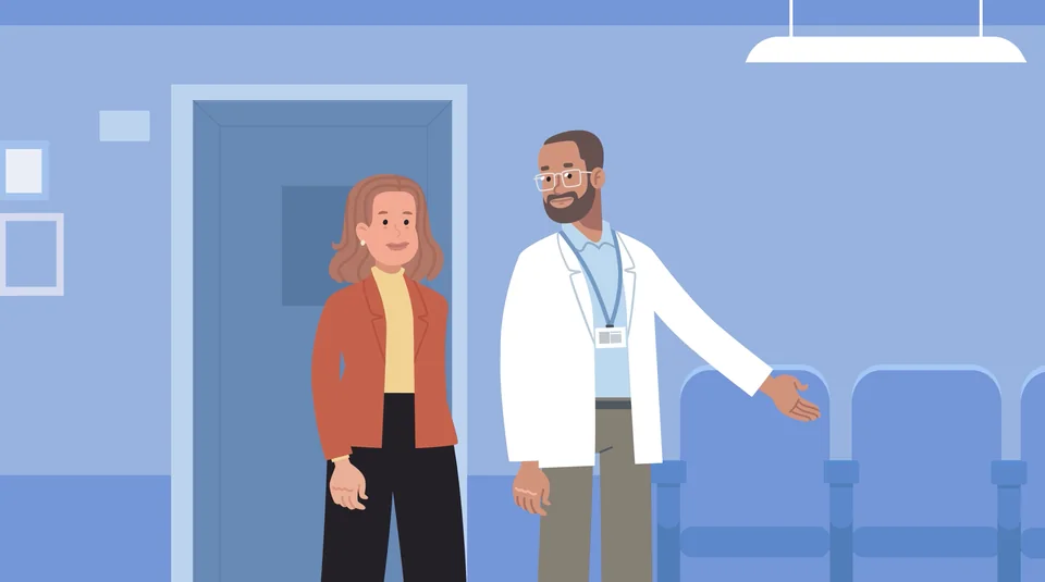 Patient speaking with a doctor in a Hancock Health waiting room